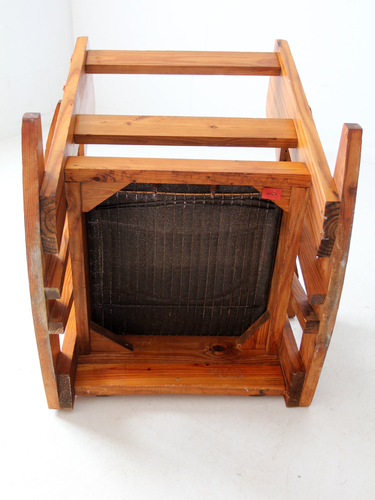 vintage pine rocking chair with plaid tweed cushions