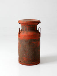 vintage red farmhouse milk can