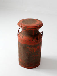 vintage red farmhouse milk can
