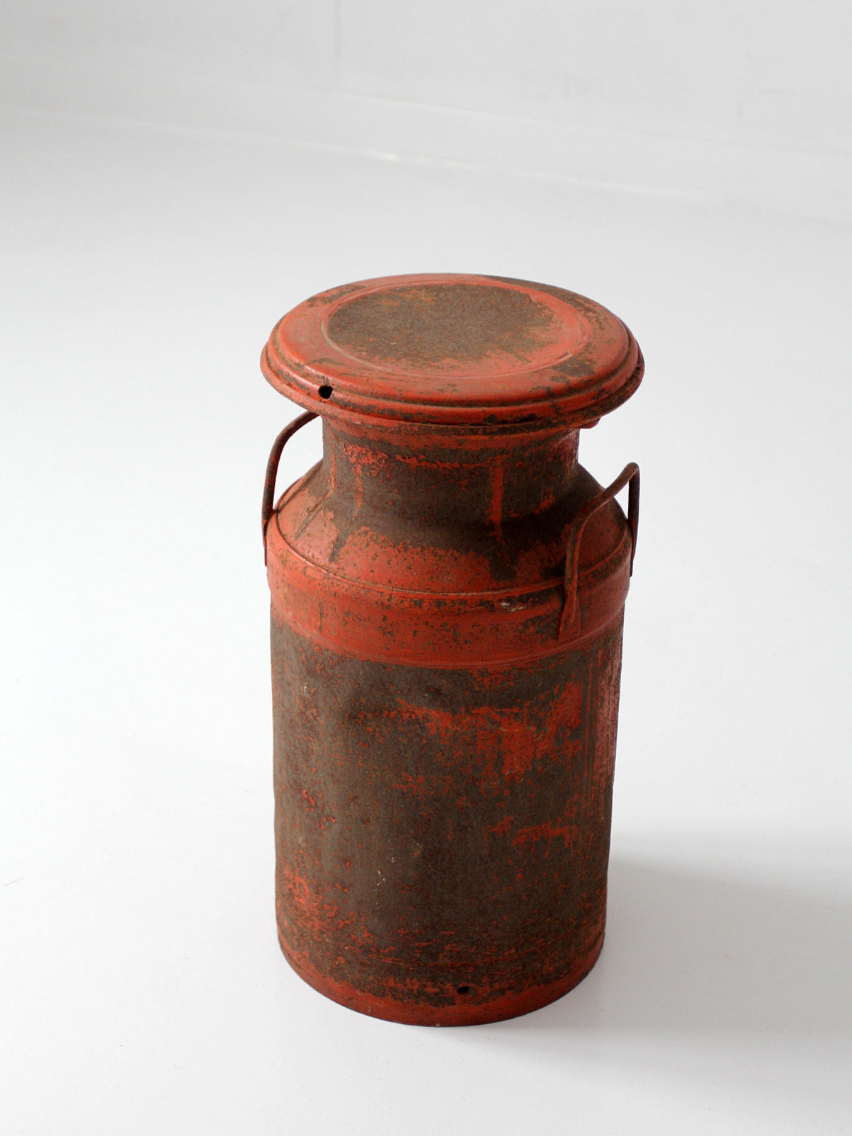 vintage red farmhouse milk can