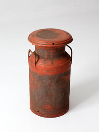 vintage red farmhouse milk can