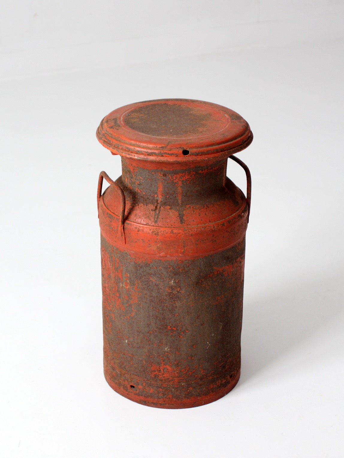 vintage red farmhouse milk can