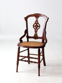 antique Victorian Eastlake chair with cane seat