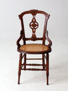 antique Victorian Eastlake chair with cane seat