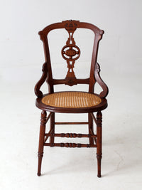 antique Victorian Eastlake chair with cane seat