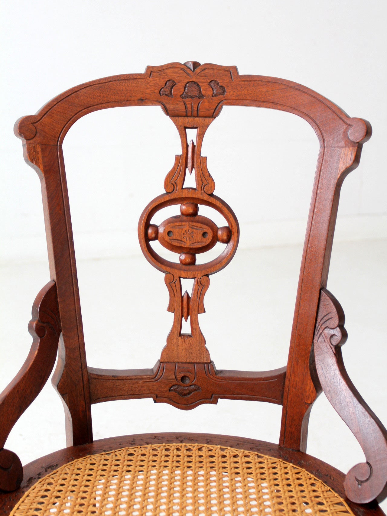 antique Victorian Eastlake chair with cane seat