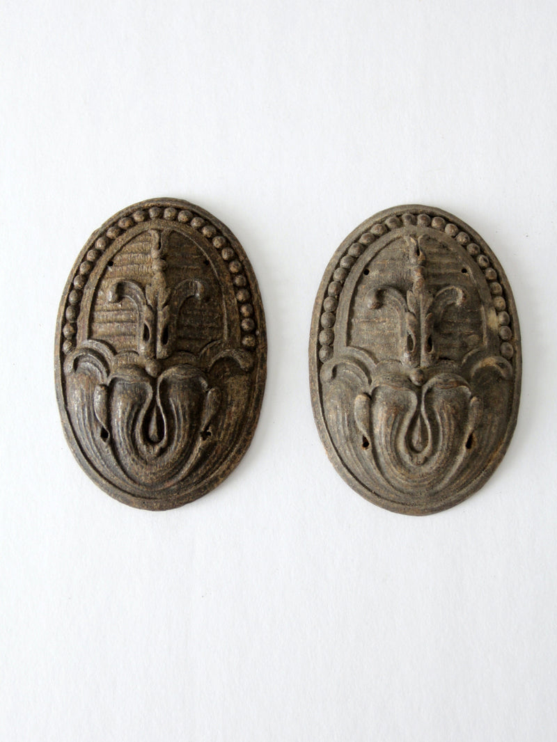 antique fleur de lis wood medallion pair