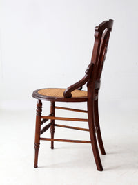 antique Victorian Eastlake chair with cane seat