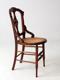 antique Victorian Eastlake chair with cane seat