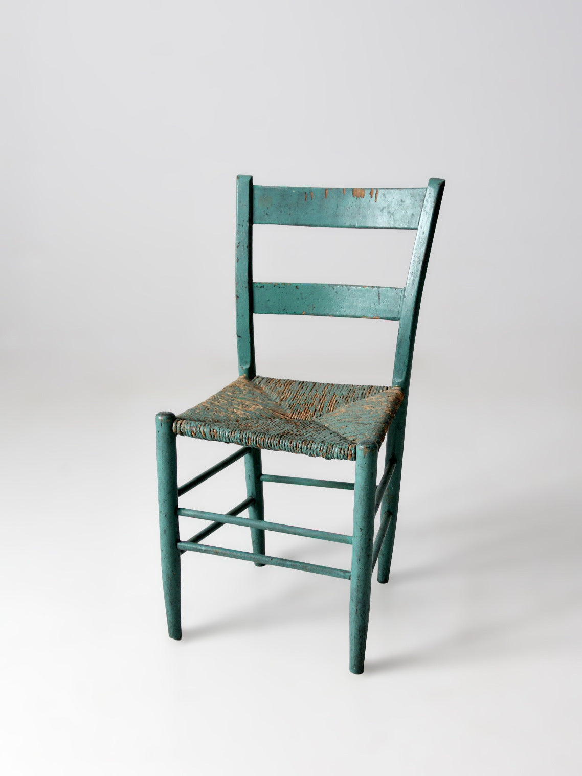 antique American painted ladder back rush seat chair