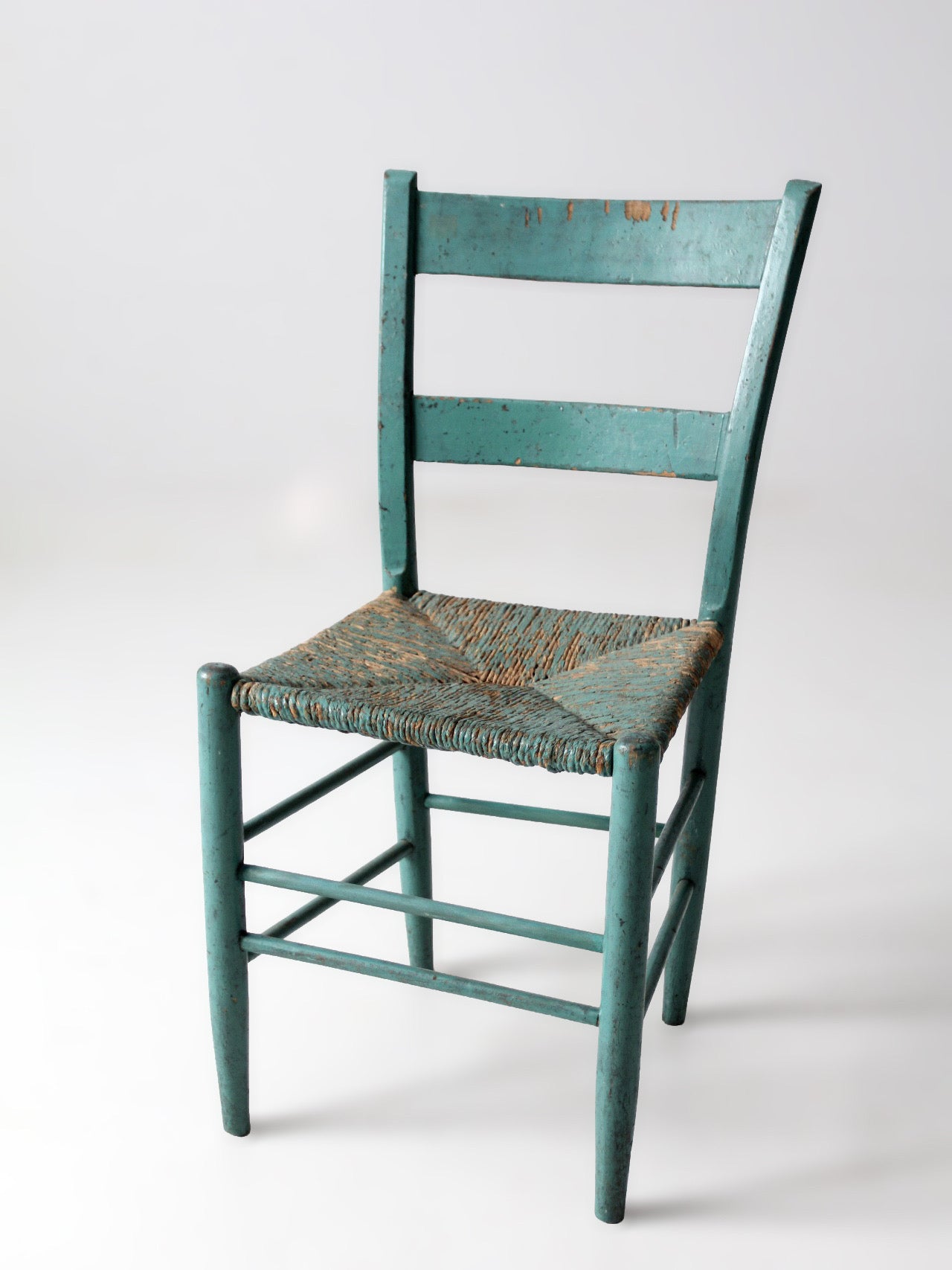antique American painted ladder back rush seat chair