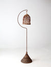 antique wicker bird cage and stand