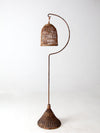 antique wicker bird cage and stand