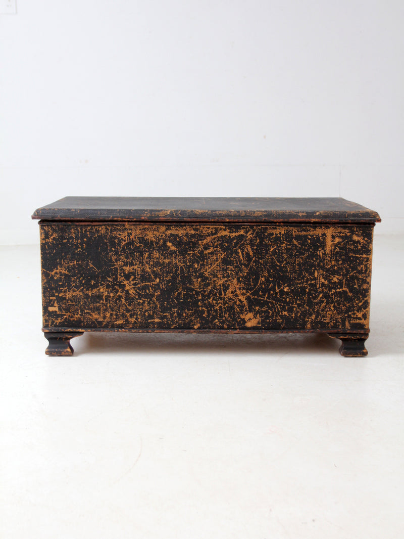 antique black woven canvas trunk
