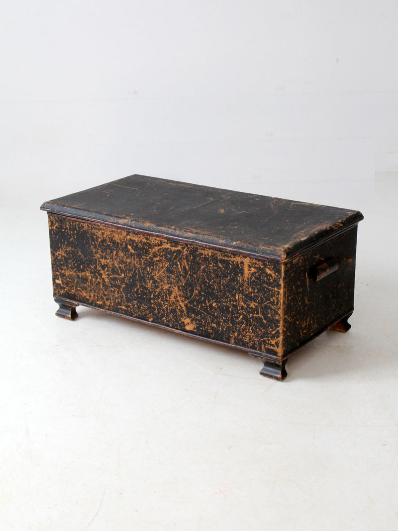antique black woven canvas trunk