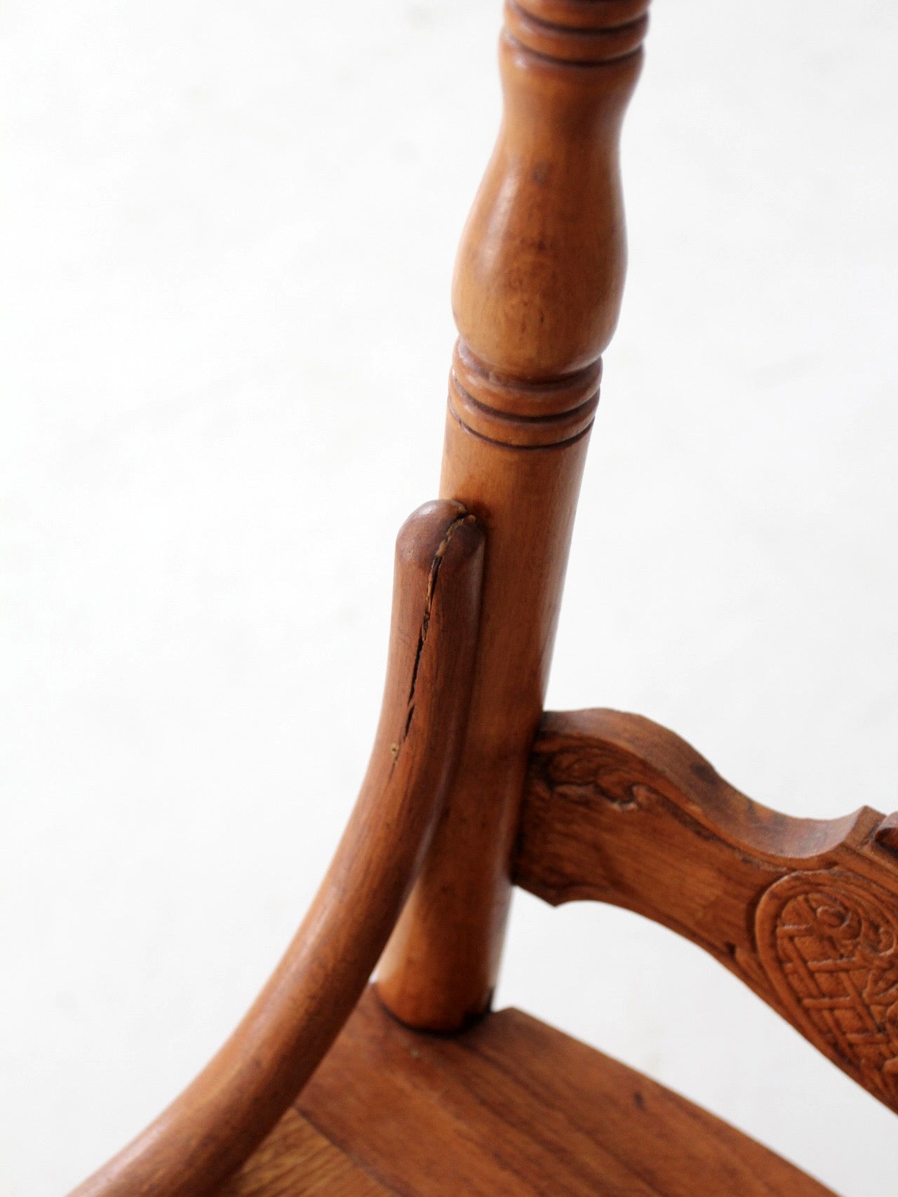 antique pressed back oak chair with cane seat