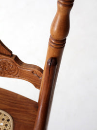 antique pressed back oak chair with cane seat