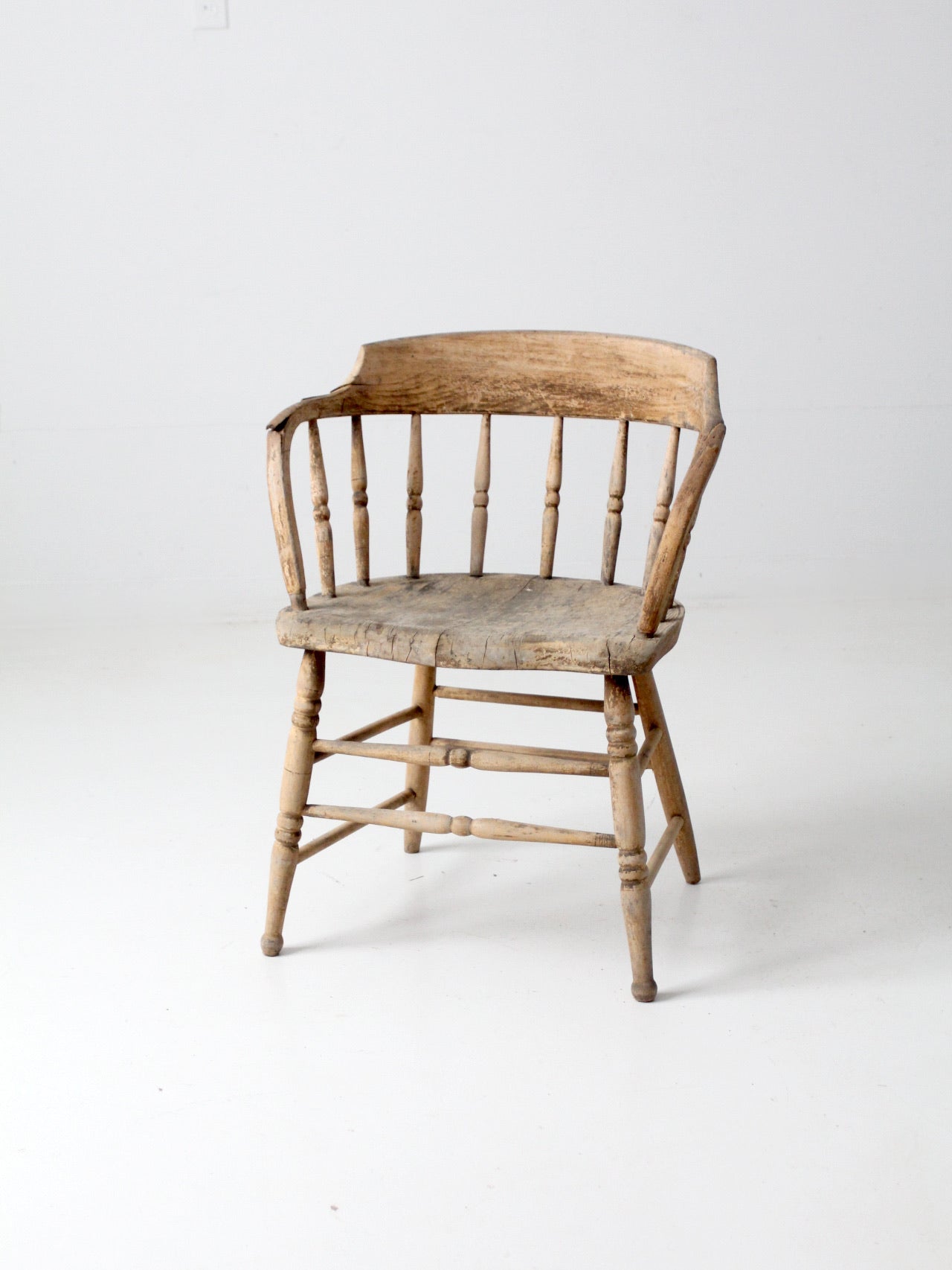 antique rustic captain's chair