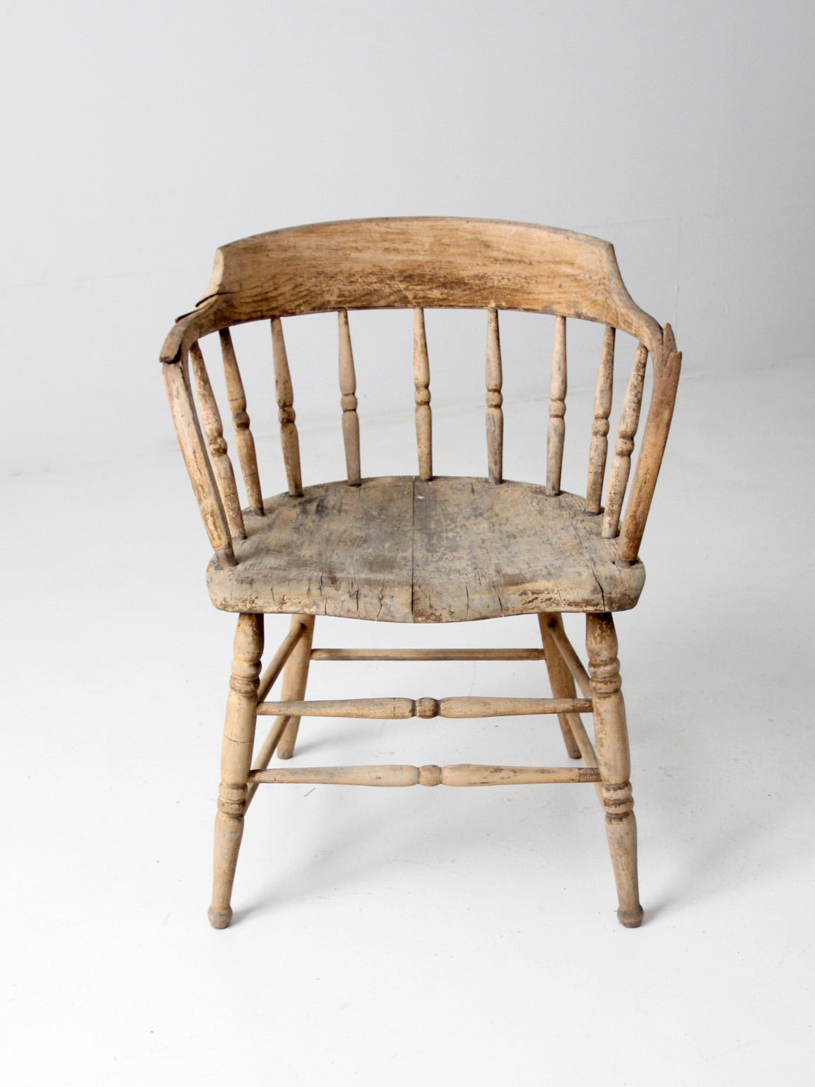 antique rustic captain's chair