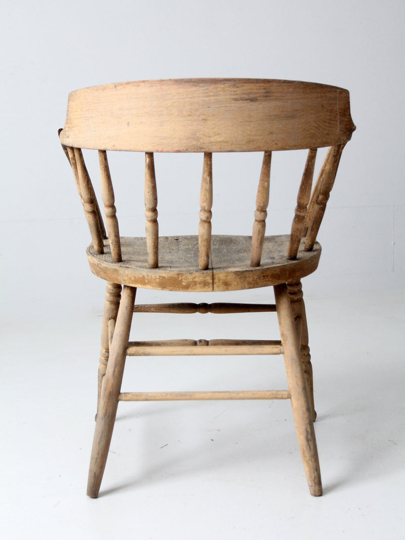 antique rustic captain's chair