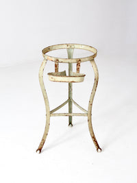antique iron stand with ball feet