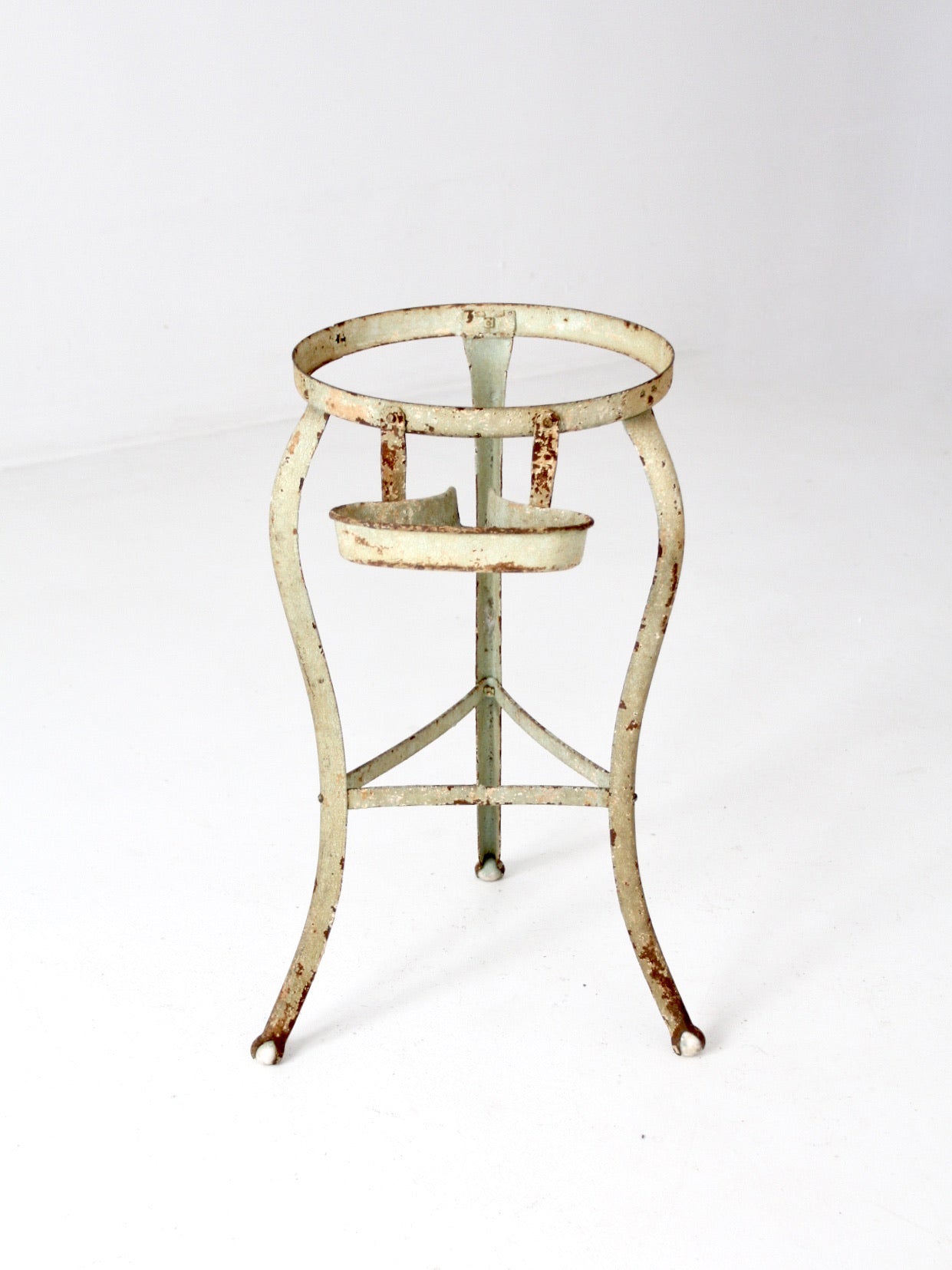 antique iron stand with ball feet