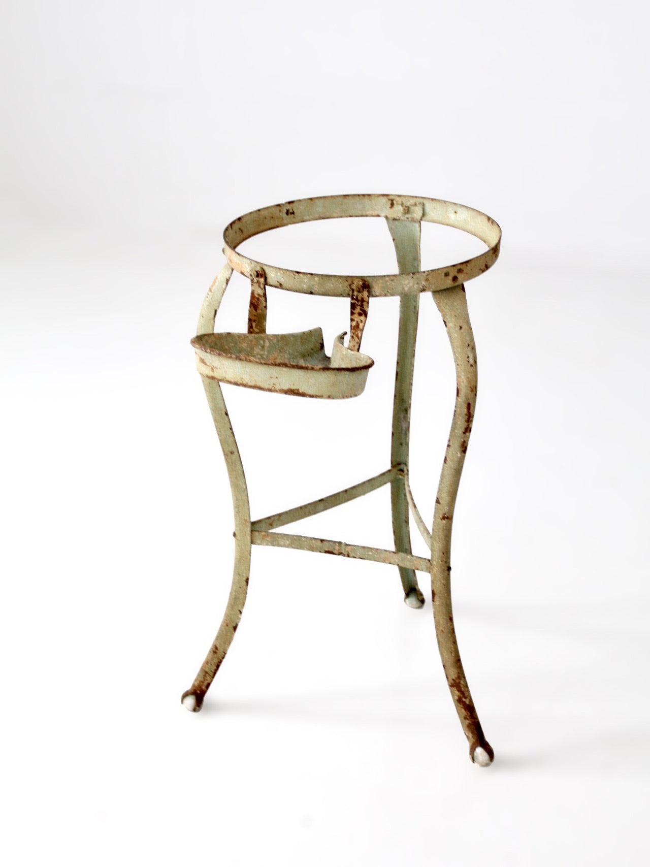 antique iron stand with ball feet