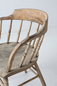 antique rustic captain's chair