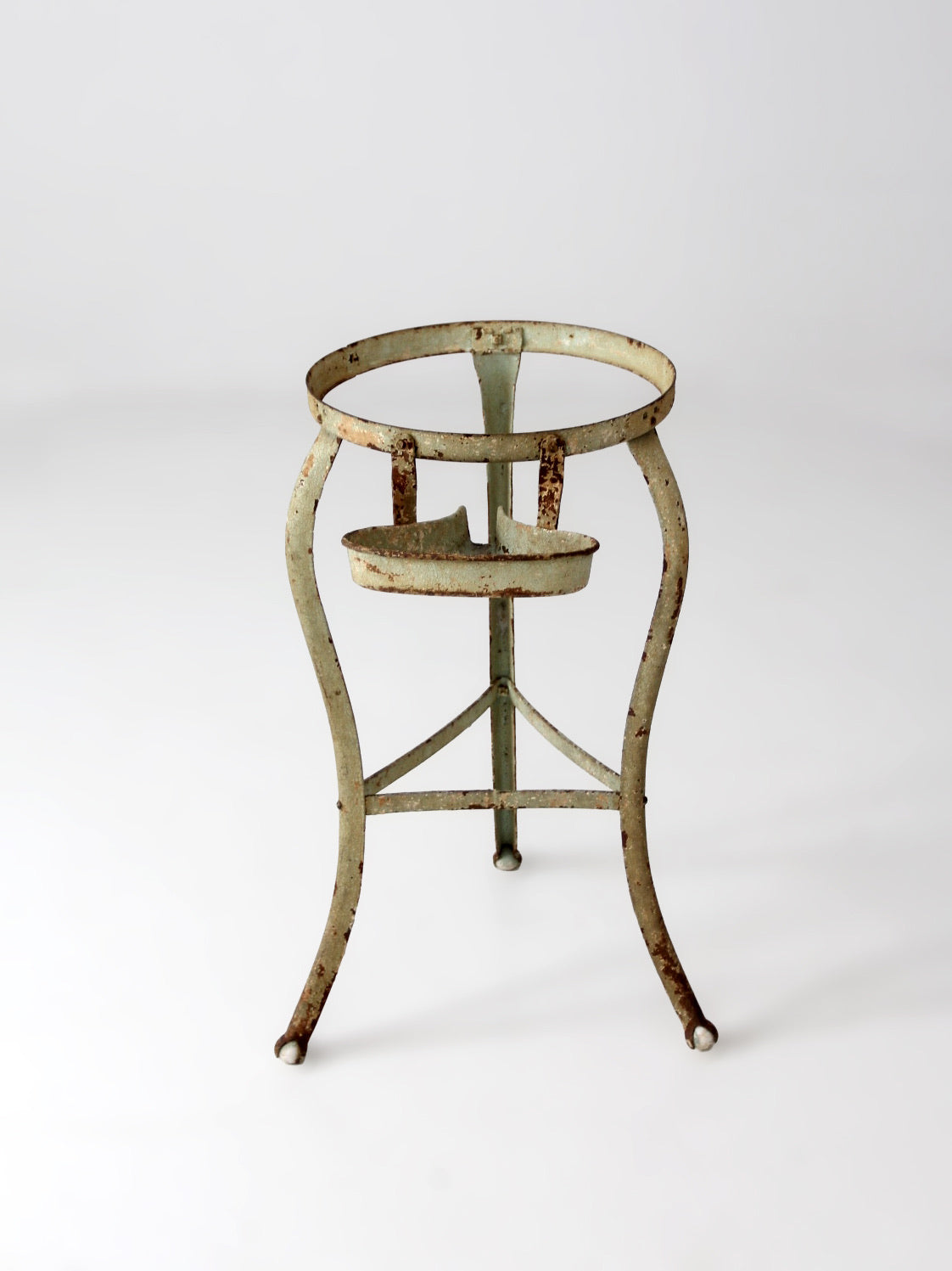 antique iron stand with ball feet