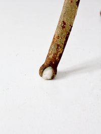 antique iron stand with ball feet