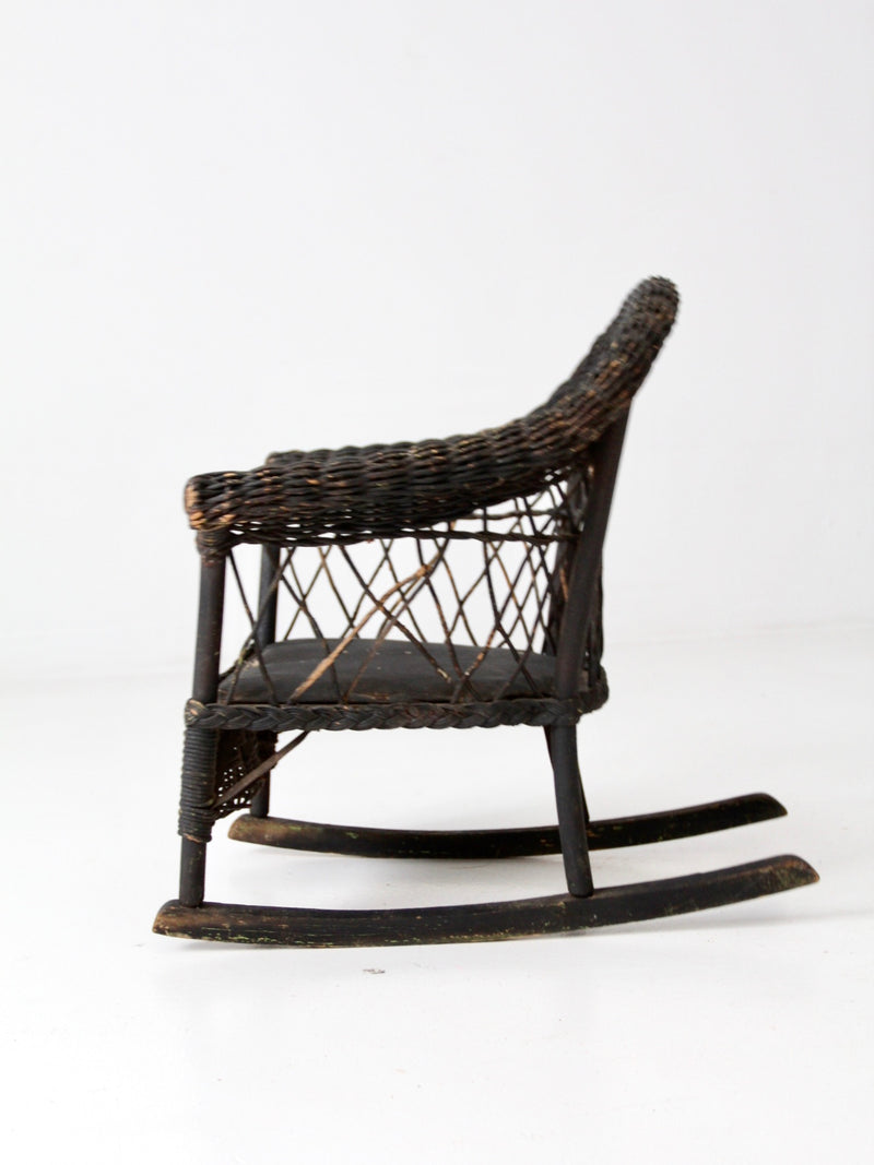 antique Victorian black wicker child's rocking chair