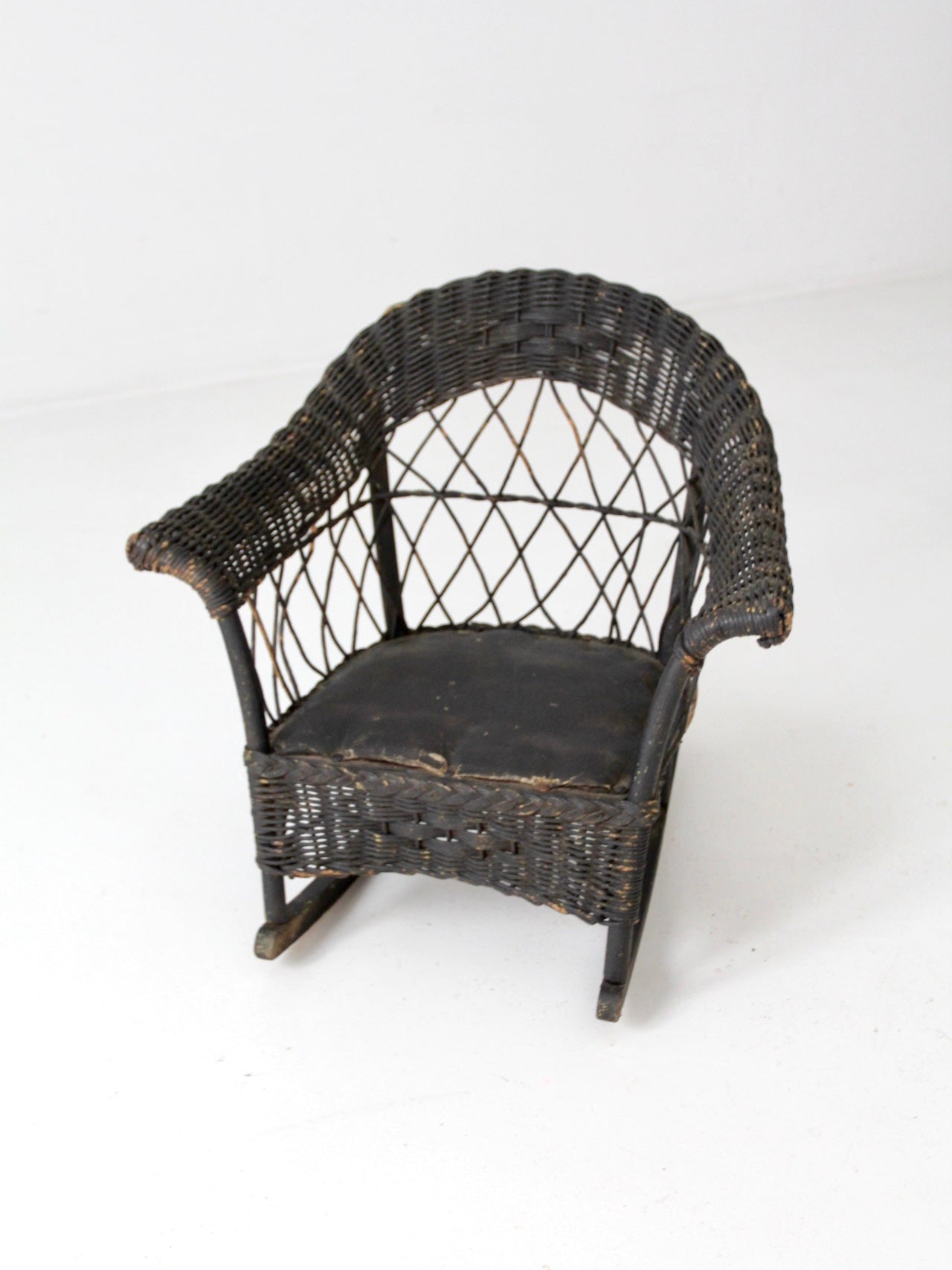antique Victorian black wicker child's rocking chair