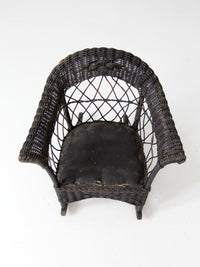antique Victorian black wicker child's rocking chair