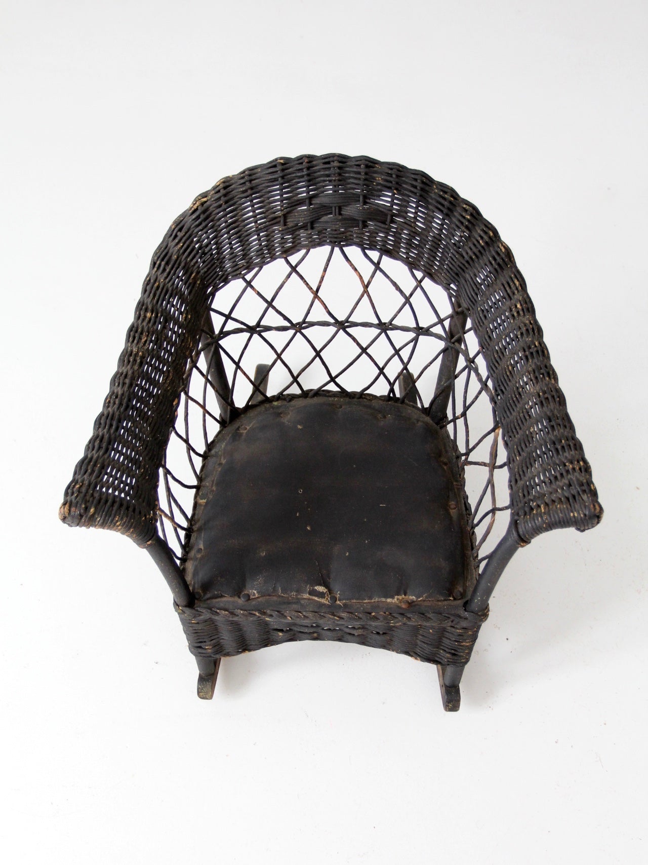 antique Victorian black wicker child's rocking chair