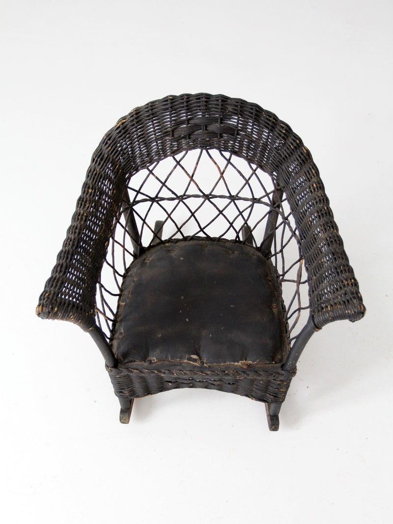 antique Victorian black wicker child's rocking chair