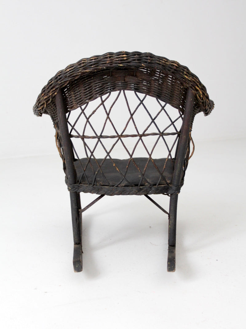 antique Victorian black wicker child's rocking chair