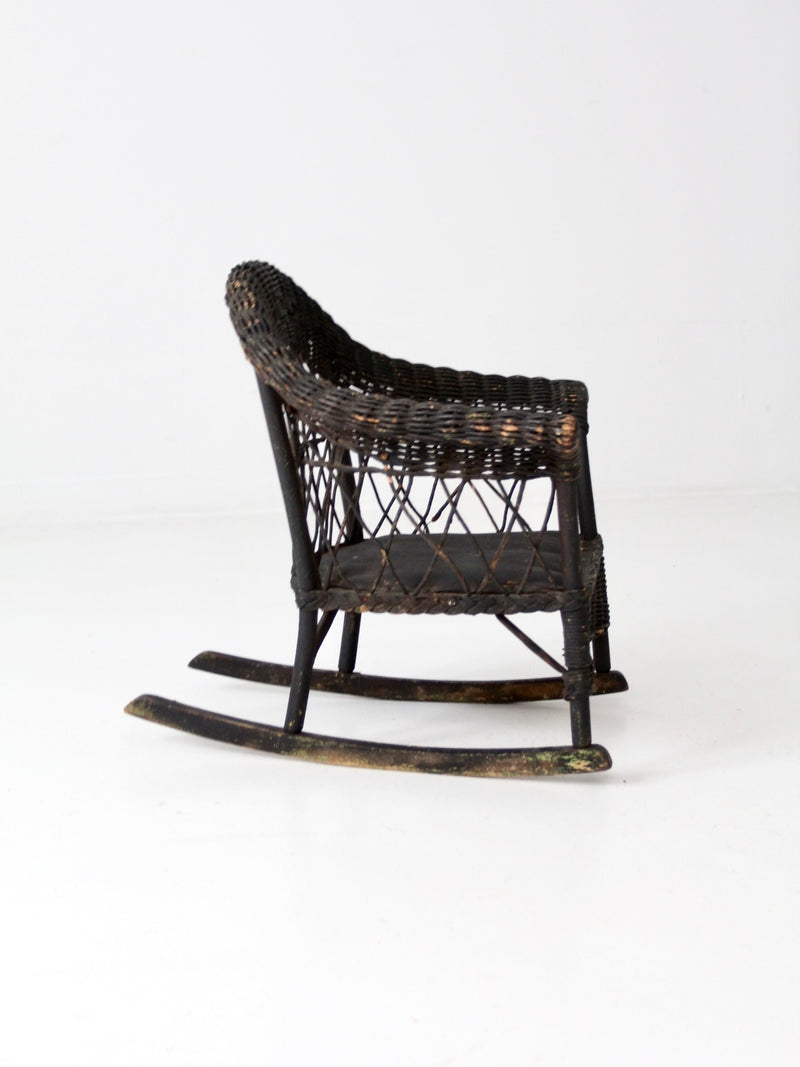 antique Victorian black wicker child's rocking chair