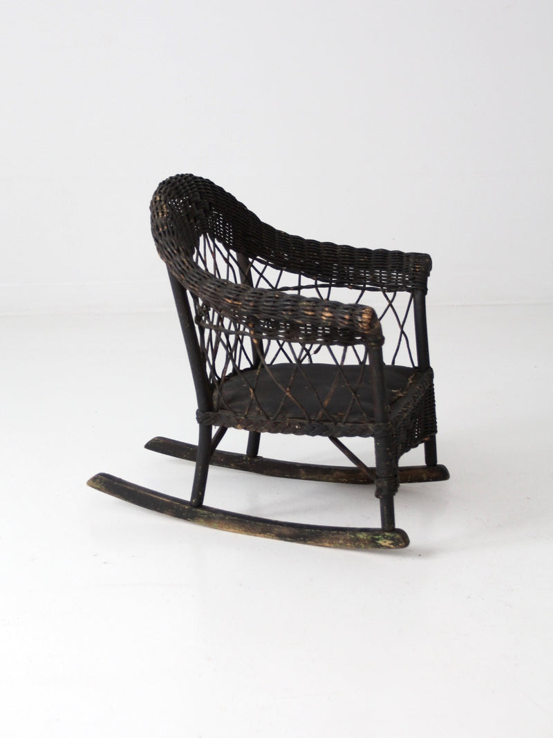 antique Victorian black wicker child's rocking chair
