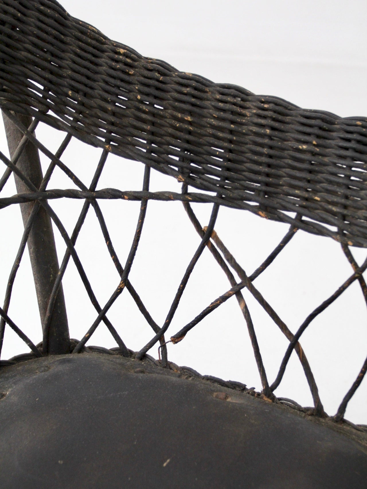 antique Victorian black wicker child's rocking chair