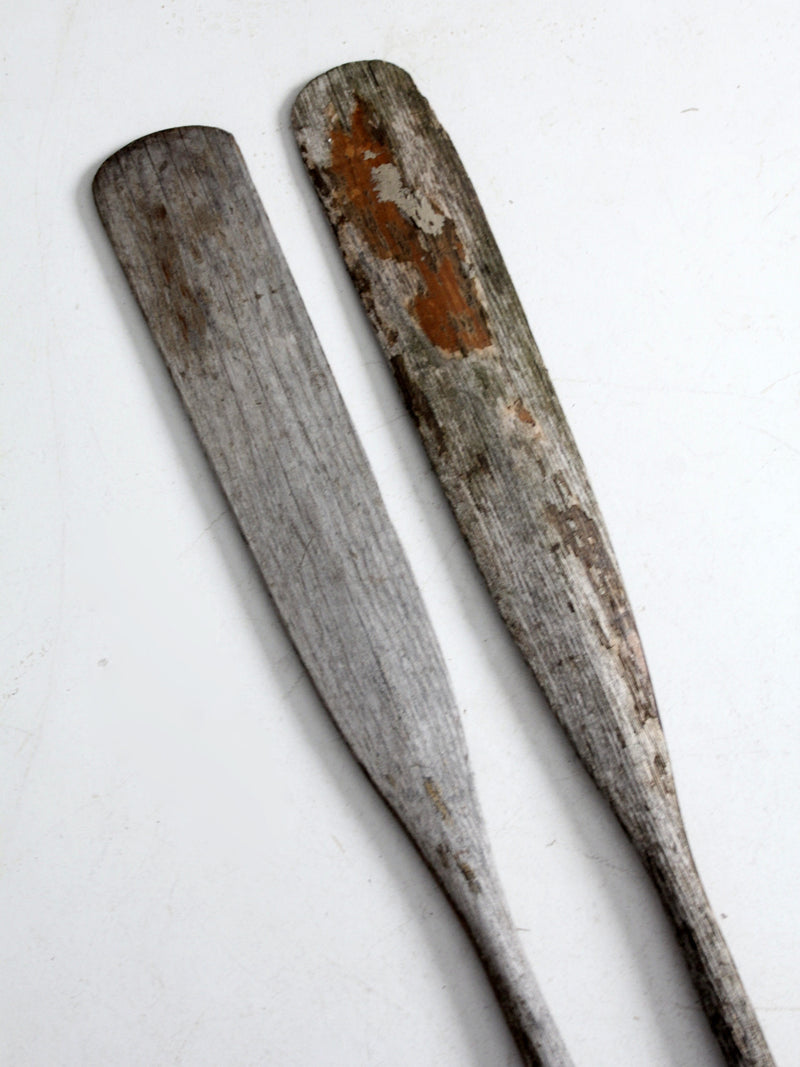 antique distressed wooden oars pair