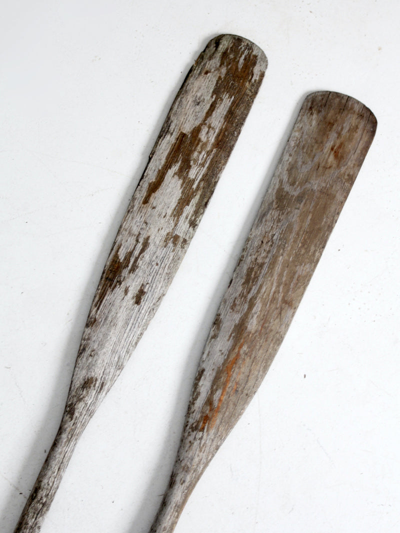 antique distressed wooden oars pair