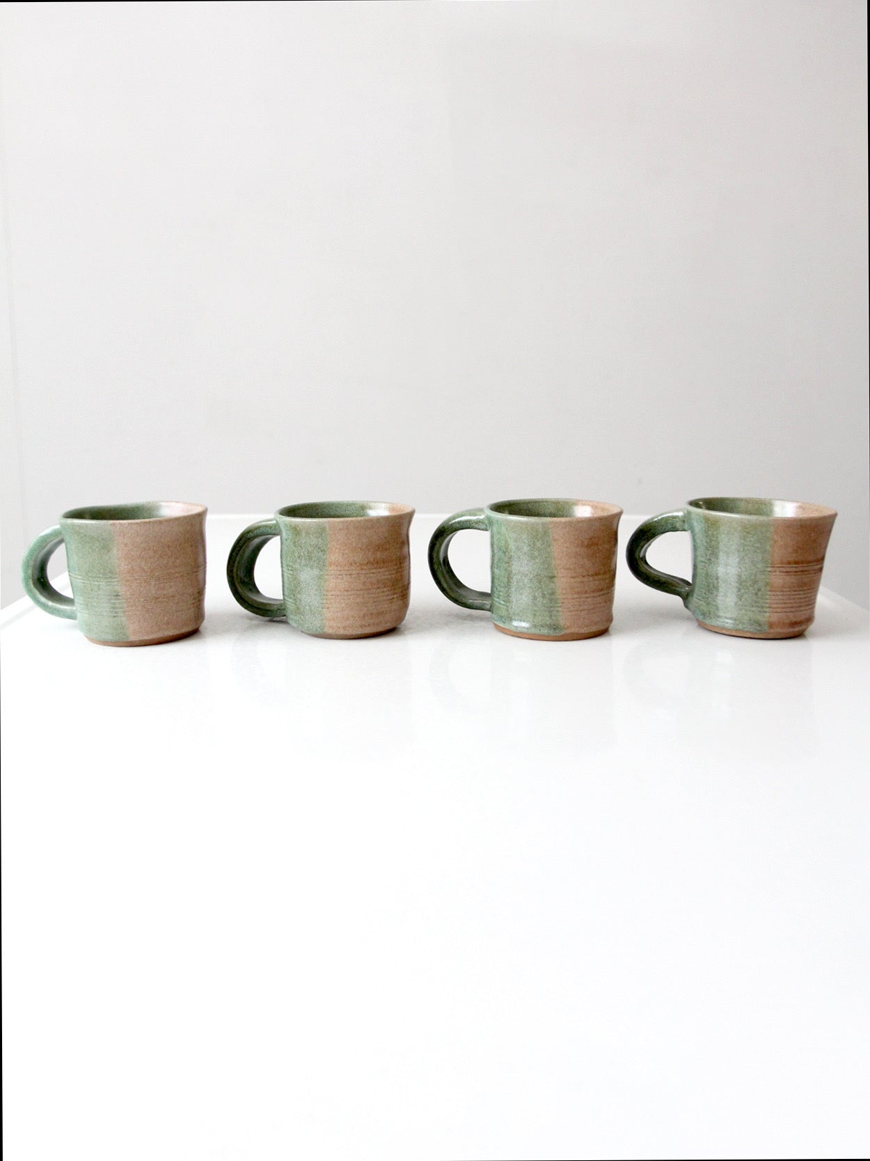 set of 4 vintage studio pottery mugs