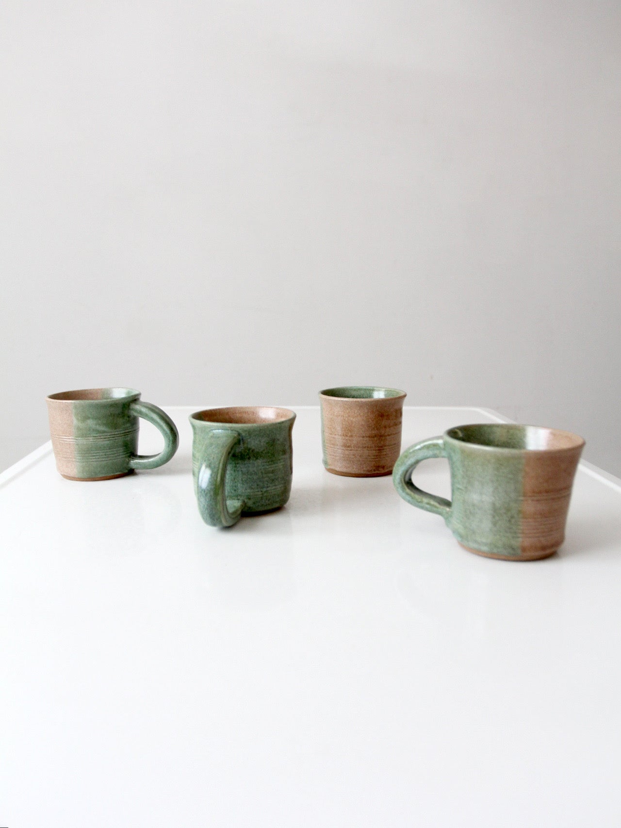 set of 4 vintage studio pottery mugs
