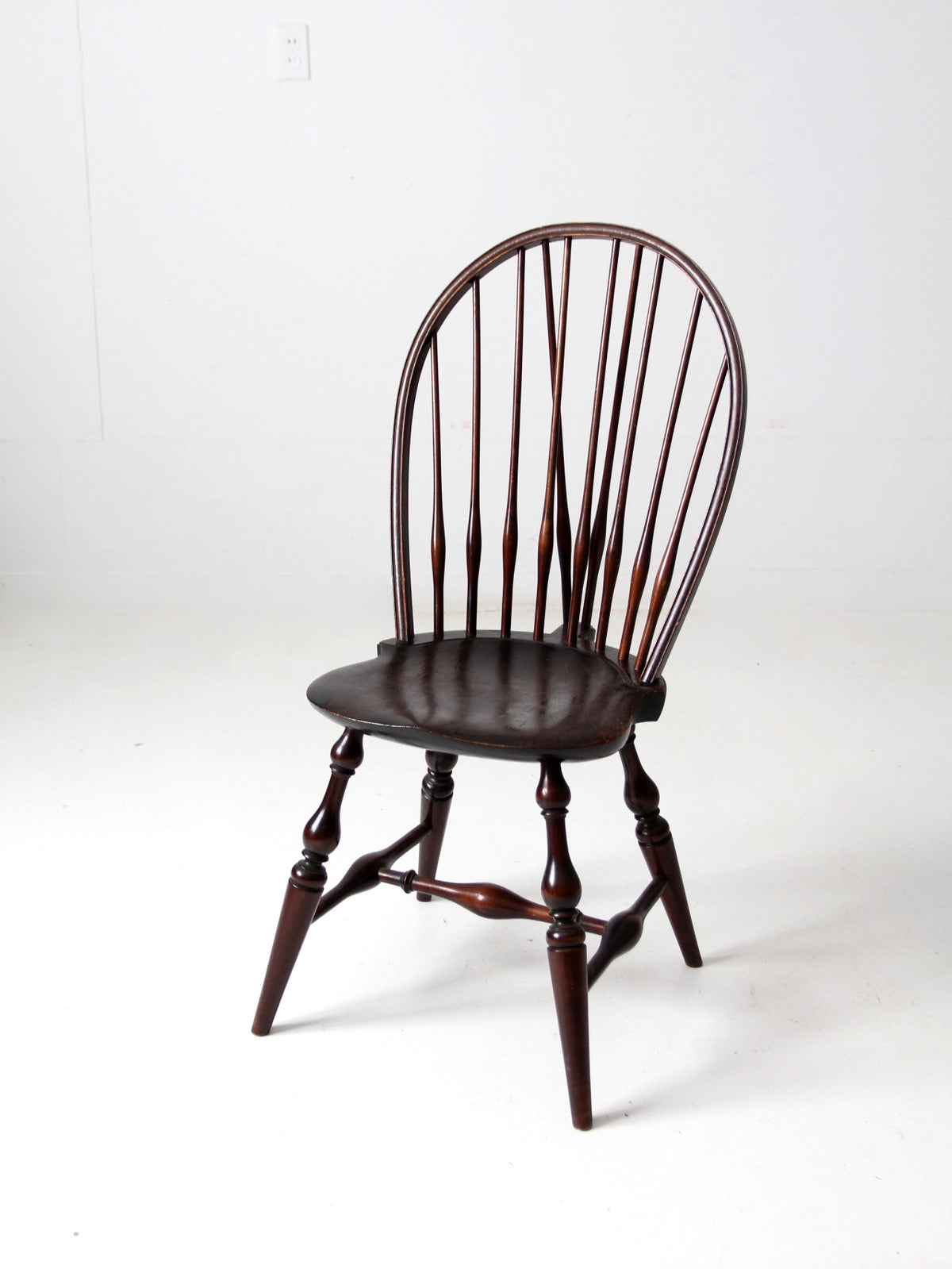 antique bow back Windsor chair with tail brace