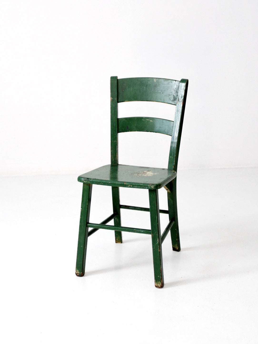 antique green painted ladder back chair