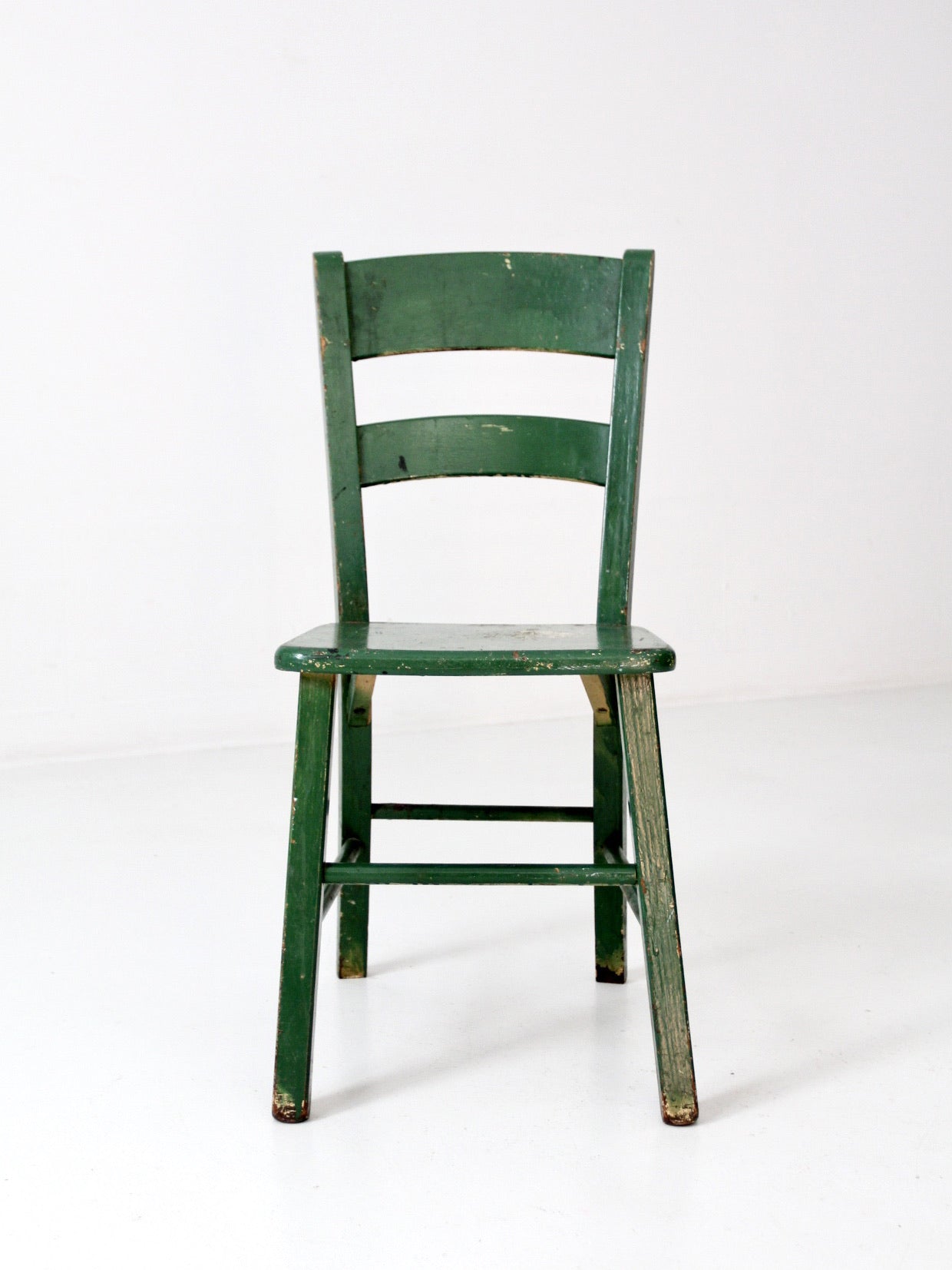 antique green painted ladder back chair