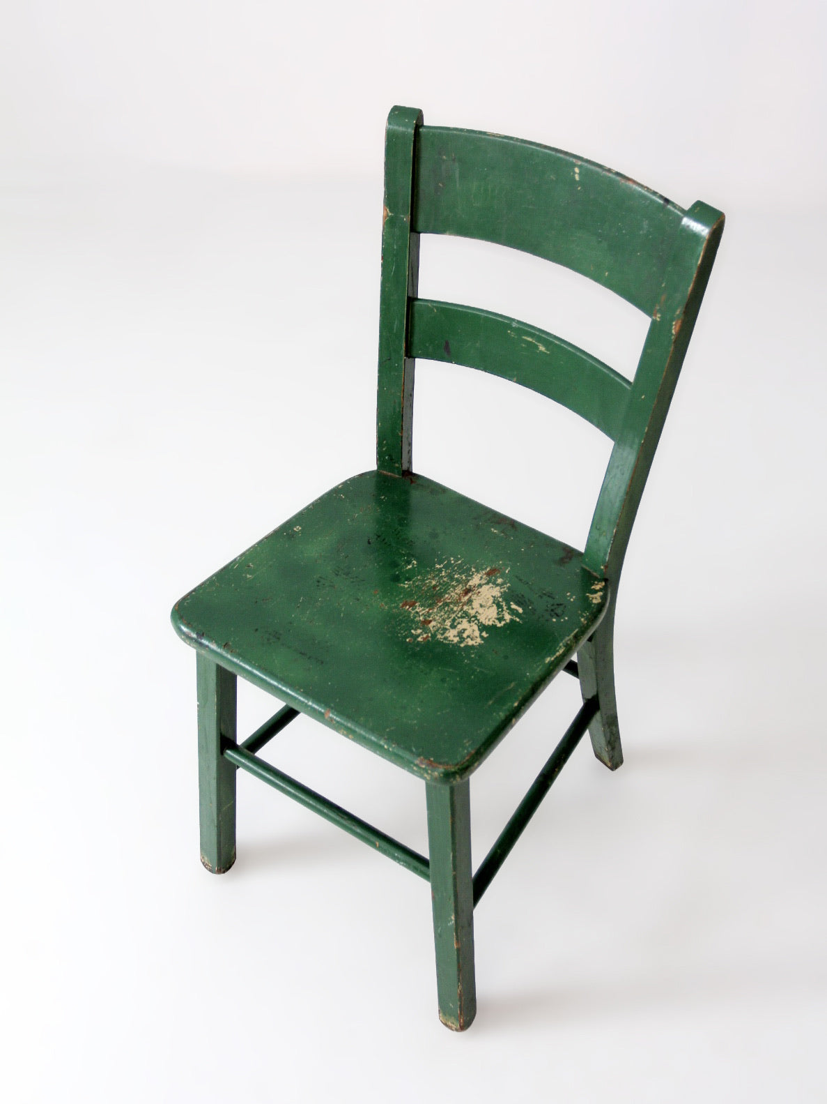 antique green painted ladder back chair