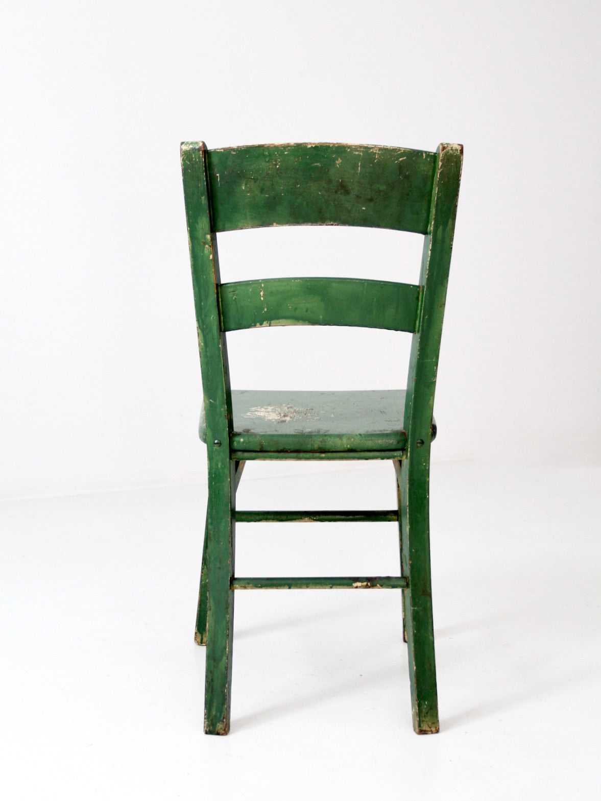 antique green painted ladder back chair