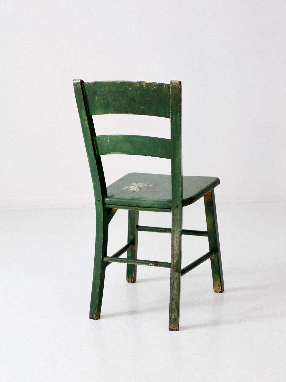 antique green painted ladder back chair