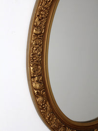 mid-century oval gilt wall mirror